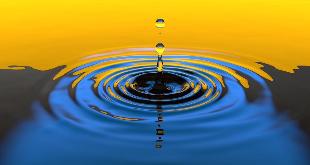 water droplet creating ripples