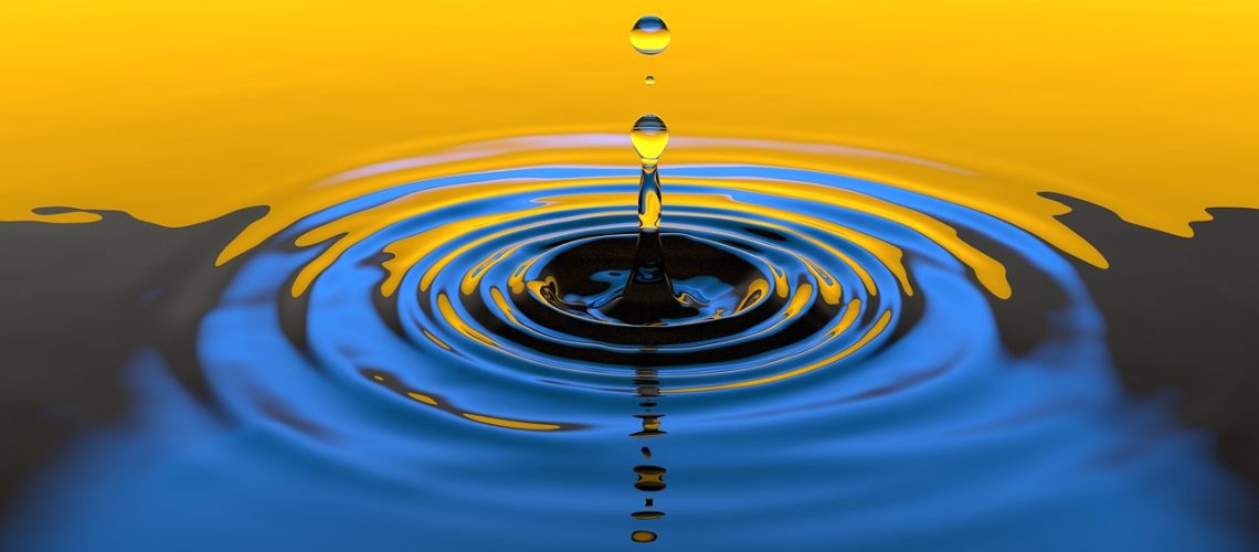 water droplet creating ripples